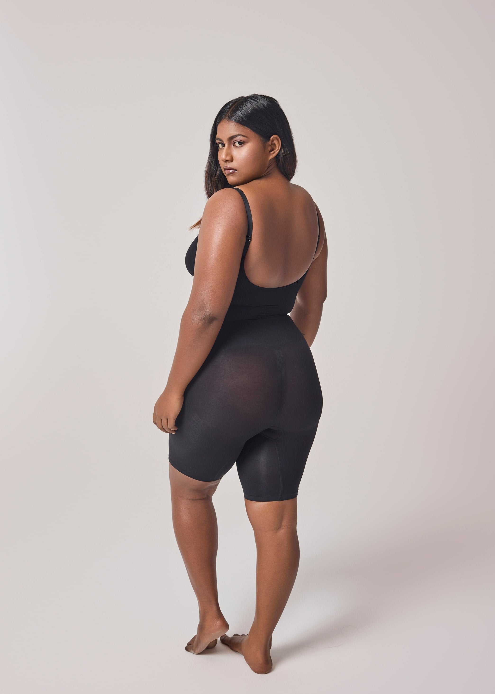 intense mid thigh bodyshaper in black color