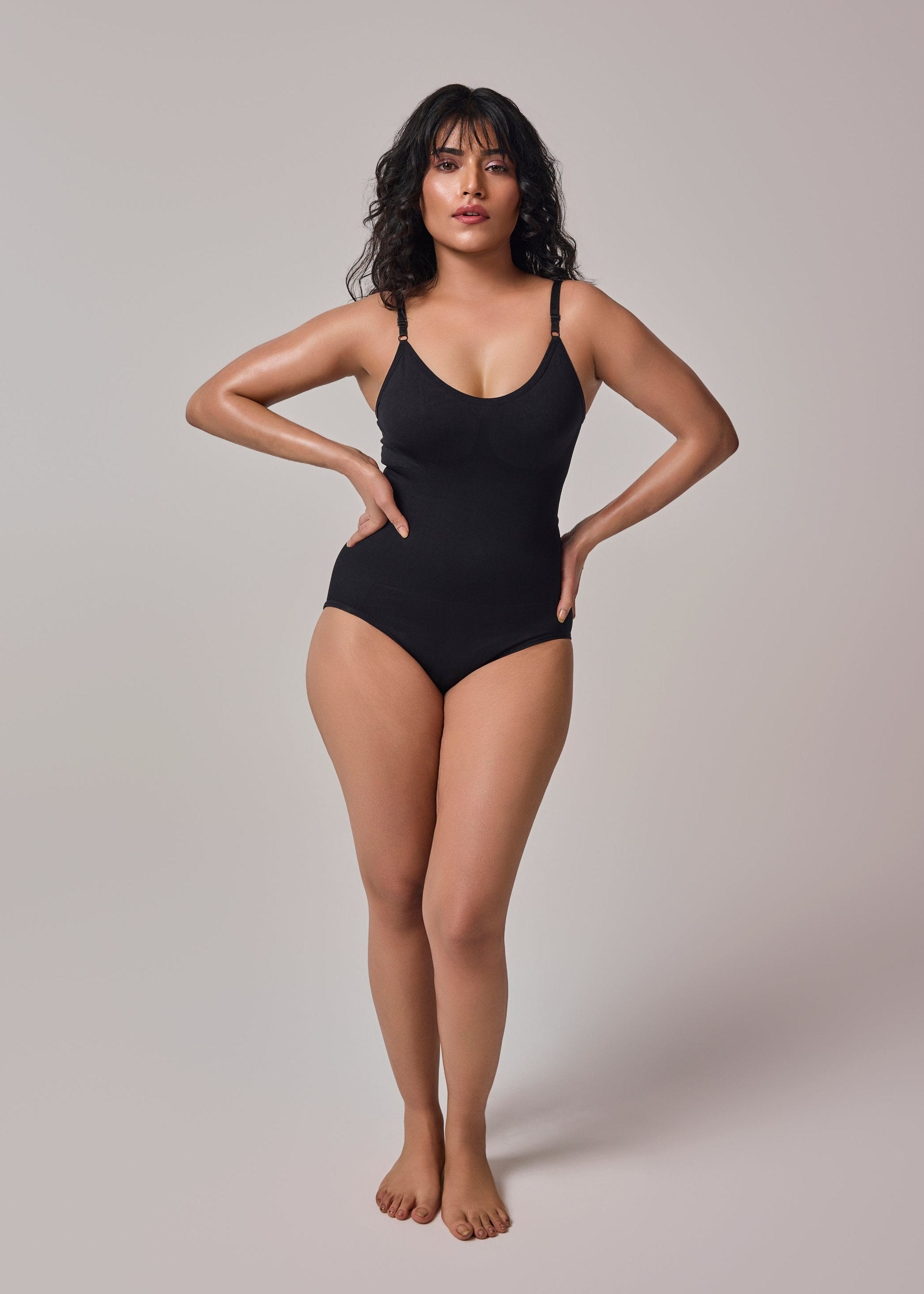 snatching bodysuit shaper in black color front side view