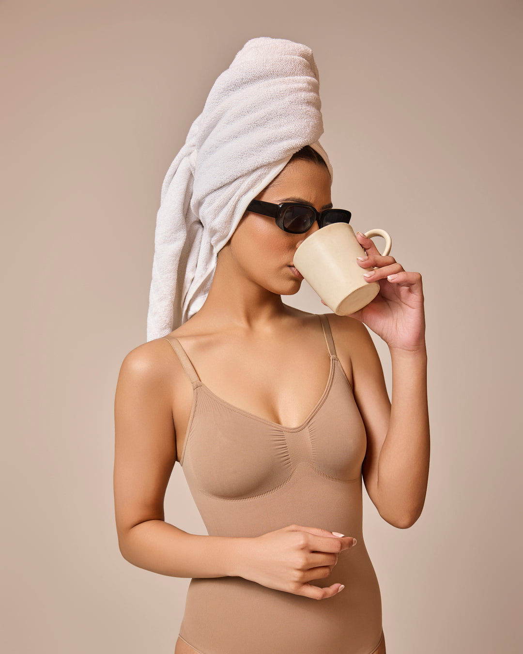 Invogue Shop seamless beige bodysuit shapewear designed for a contoured, sleek silhouette